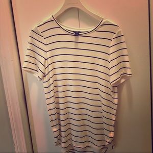 A short sleeve top with narrow black stripes.